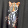 vestido midi negro con mangas y diseño de leopardo en el pecho que la hace más rebelde y único un diseño muy pepa rodriguez