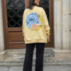 Sudadera en algodón amarillo con estampado delantero y espalda