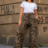 Pantalón Tanzania para mujer con estampado animal print, pierna ancha y diseño palazzo exclusivo.